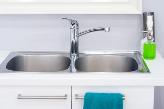 Interior of bathroom with sink basin faucet. Modern design of bathroom.