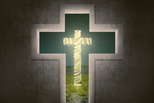 Cross shape with christ symbol with christmas lights decoration on the field
