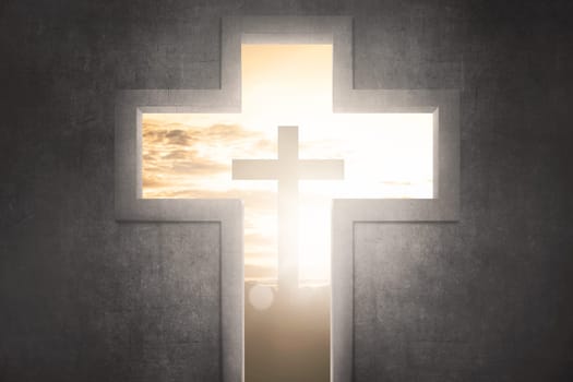 Cross shape with christ symbol at sunset background
