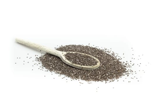 Chia seeds in wooden spoon isolated with white backgroun