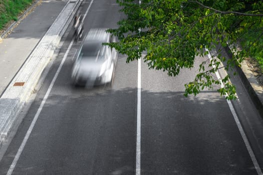 Motion blur of cars in aerial view over the road. (Speed limits - Infractions - Speed Cameras)