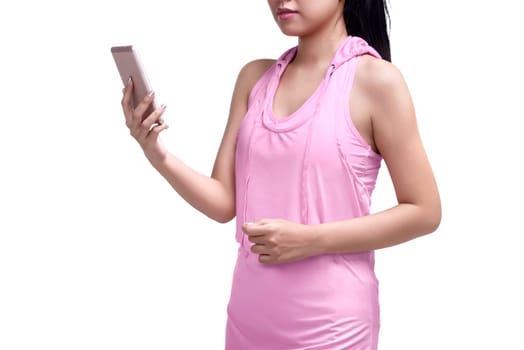 Portrait of asian fitness woman in sportswear with a smartphone posing isolated over white background
