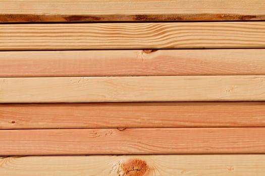Stacked pine planks on side