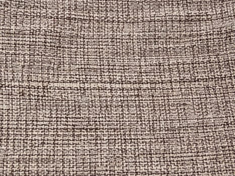 Detail of rude cotton fabric patterns in neutral close-up colors
