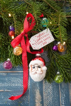 Froehliche decoration with fir branches for Christmas