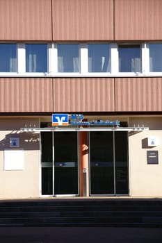 Nieder-Olm,Germany - October 14,2017: The façade and logo of Mainzer Volksbank of a financial building on October 14,2017 in Nieder-Olm.