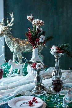 Beautiful Christmas table setting with decorations in vintage style