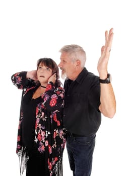 A husband is raising his hand agents his wife and shouting, the wife.cover her ears, isolated for white background.