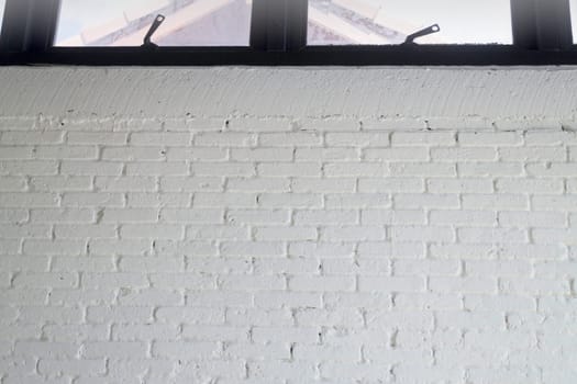 White brick wall in minimal room, stock photo