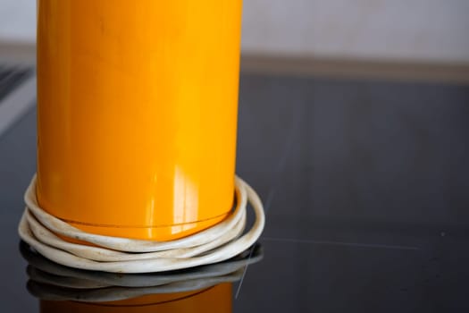 Orange electric coffee grinder from the 70s