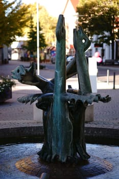 Nieder-Olm,Germany - October 14,2017: The sculpture and fountain Waterfowl by Johannes Metten on October 14,2017 in Nieder-Olm.