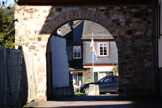 Taunusstein-Wehen,Germany - October 15,2017: The gate entrance of Wehen Castle with a round arch and field stones on October 15,2017 in Taunusstein-Wehen.