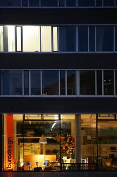 Darmstadt,Germany - October 31,2017: A neon-lit office design store at night at the train station on October 31,2017 in Darmstadt.
