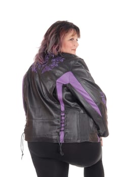 A overweight woman standing in a black leather jacket from the back,.looking over her shoulder, isolated for white background.