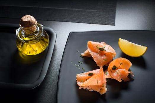 Pieces of fresh smoked salmon served on a plate