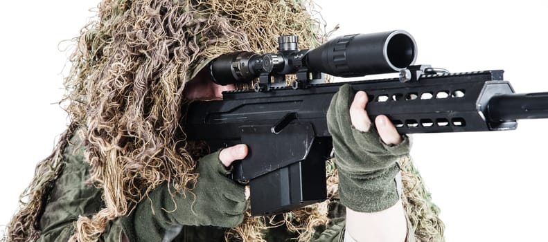 U.S. Army sniper wearing a ghillie suit