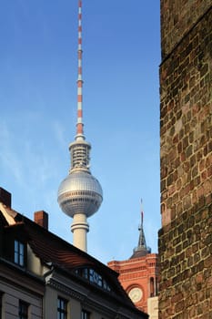 TV tower and red town hall in Berlin seen from the Nikolaiviertel