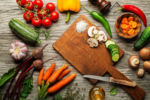 Slicing fresh vegetables for cooking. Healthy eating concept
