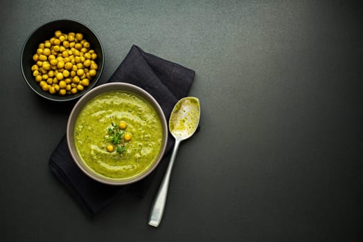 Fresh healthy vegetable pea soup overhead shoot