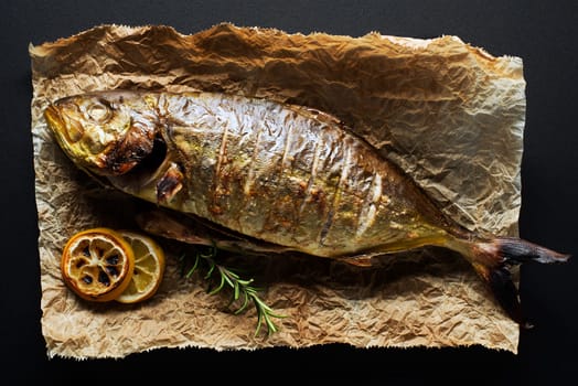 Grilled sea fish with lemon herbs and spices
