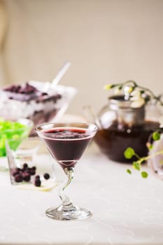 Cocktail of currant fresh berries on the table