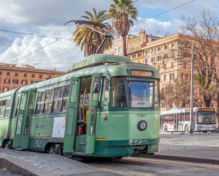 Rome, Italy, february 11, 2017: ancient tram moving in Piazza Risorgimento in Rome, Italy