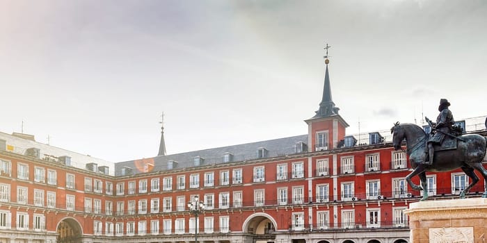 the equestrian bronze statue of king Philip lll in Plaza Mayor in Madrid, Spain