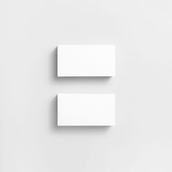 Photo of blank business cards with soft shadows on paper background. For design presentations and portfolios. Top view.