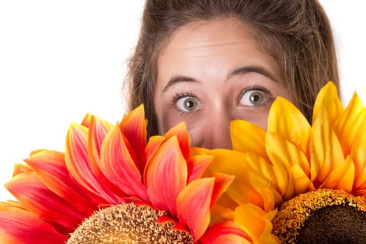 Beautiful young woman with flowers isolated in a white background