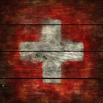 flag of Switzerland on weathered board wall