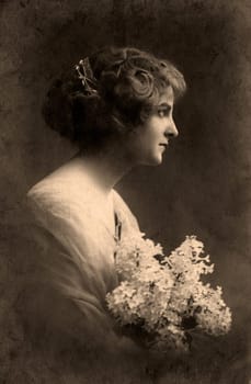 Vintage portrait of a young girl. The shot was taken around 1912 year.