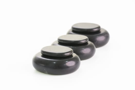 Hot stones or basalt stones close up