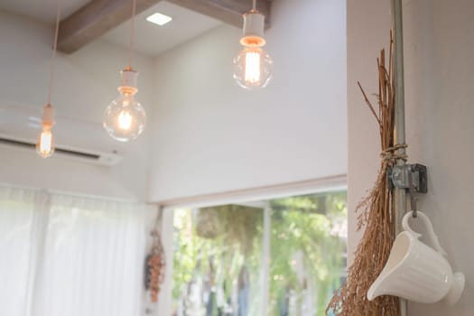 Minimal style interior decorated with vintage light bulbs, stock photo