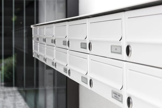 Mailboxes and lock in rows at entrance. Shallow DOF.