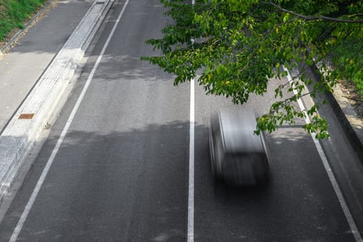Motion blur of cars in aerial view over the road. (Speed limits - Infractions - Speed Cameras)