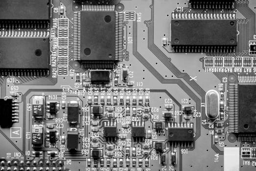 The computer electronic card with chips, microprocessors, transistors, explorers and other electronic parts.