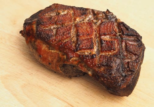 Roasted goose breast on a wooden cutting board in a kitchen, Seasonal food, Christmas food