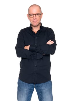 Studio recording of a man with crossed arms against a white background