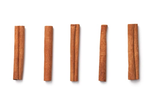 Cinnamon sticks isolated on white background. Top view