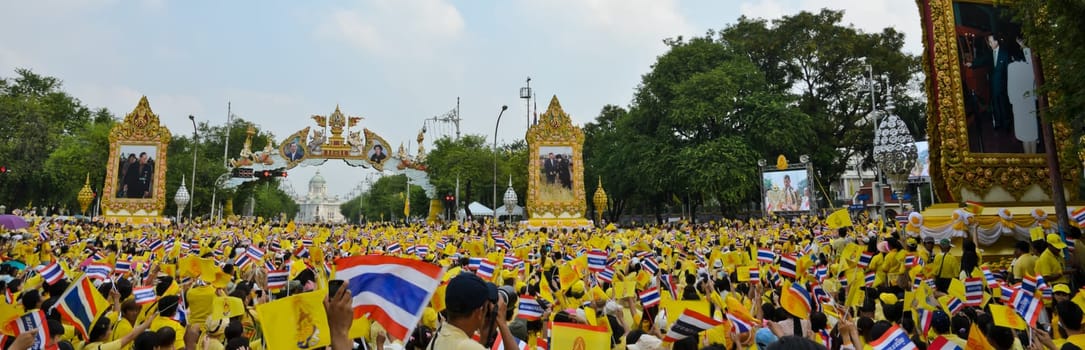 BANGKOK, THAILAND - DECEMBER 5: Thai people gather in the street to pay respect to King Bhumibol on his 85 th birthday celebration on December 5, 2012 in Bangkok, Thailand.
