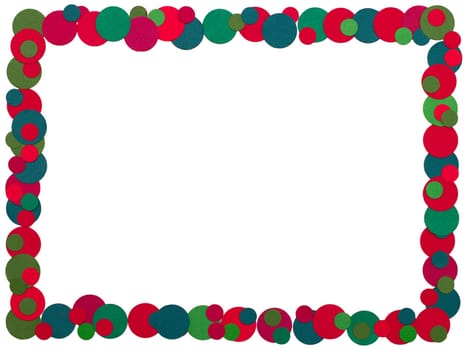 A frame made up of dots of a coloured paper using traditional christmas colours to form a rectangular frame with a white background