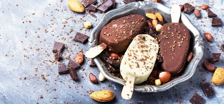 tray with summer ice cream with chocolate filling and nuts