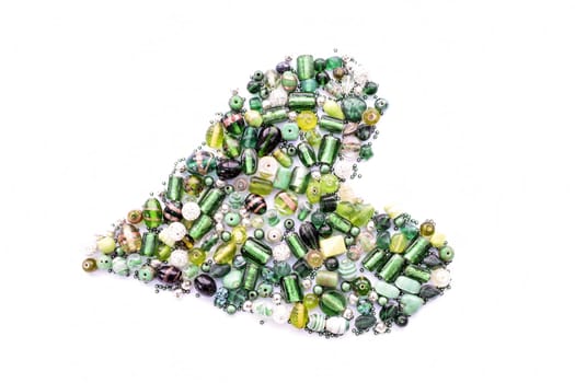 collection of green glass beads in the shape of a heart