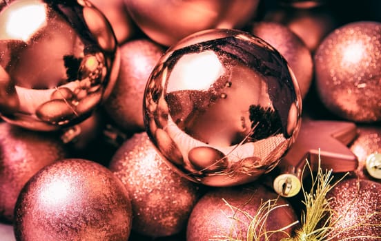 Selection of copper Christmas balls and stars for tree decoration