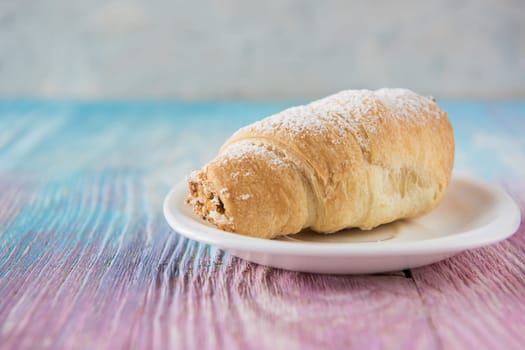 Tasty eclair on a color gradient background