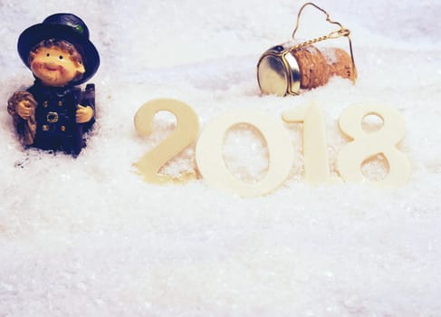 Wooden number 2018 in snow, New Year concept background