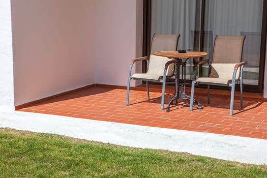 Open terrace to garden at holidays apartment resort, Andalusia, Spain