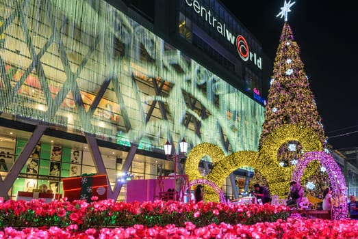 BANGKOK, THAILAND - DECEMBER 21, 2015 : Night illumination of Christmas and New Year celebration 2016 at Central World shopping mall, Ratchaprasong intersection in Bangkok, Thailand. Decorated in concept of Disneyland fairy tale