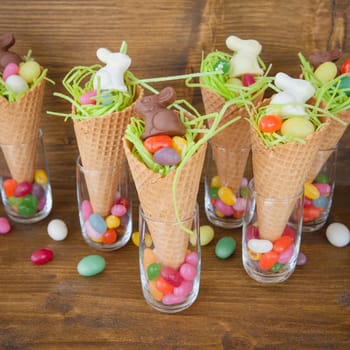 Small colorful Easter nests in waffle daes