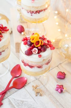 Dessert in layers with white chocolate mousse,orange and pomegranate
